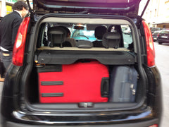 Here is the car I spent the day hiding my eyes in. The red bag is...